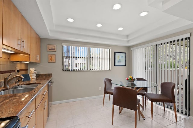 190 Dale Pl, Oldsmar, FL 34677 - dining room with healthy amount of natural light, a raised ceiling, and recessed lighting