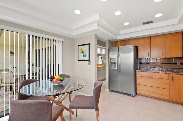 190 Dale Pl, Oldsmar, FL 34677 - dining area with a raised ceiling, recessed lighting, and light tile patterned floors