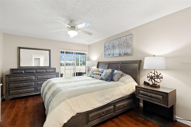 190 Dale Pl, Oldsmar, FL 34677 - bedroom with dark wood-style floors, a textured ceiling, and ceiling fan