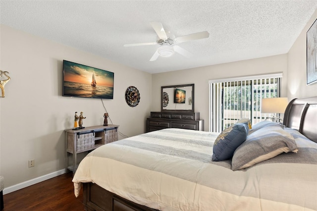 190 Dale Pl, Oldsmar, FL 34677 - bedroom featuring dark wood-style flooring, a textured ceiling, and ceiling fan