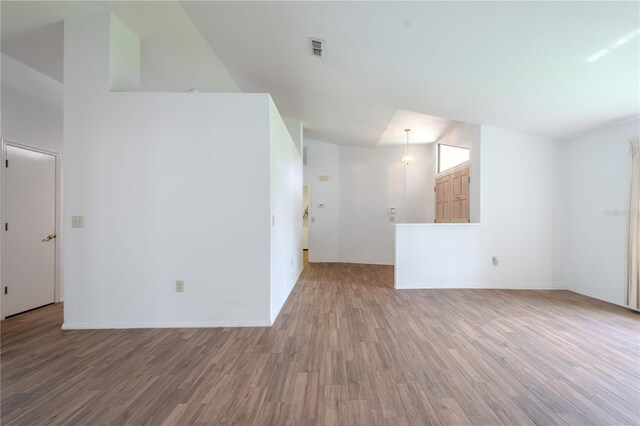 1838 Eagle Ridge Blvd, Palm Harbor, FL 34685 - unfurnished living room with wood finished floors