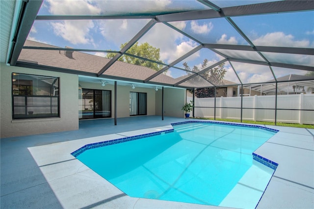 1838 Eagle Ridge Blvd, Palm Harbor, FL 34685 - view of swimming pool featuring a patio area, a ceiling fan, and a lanai