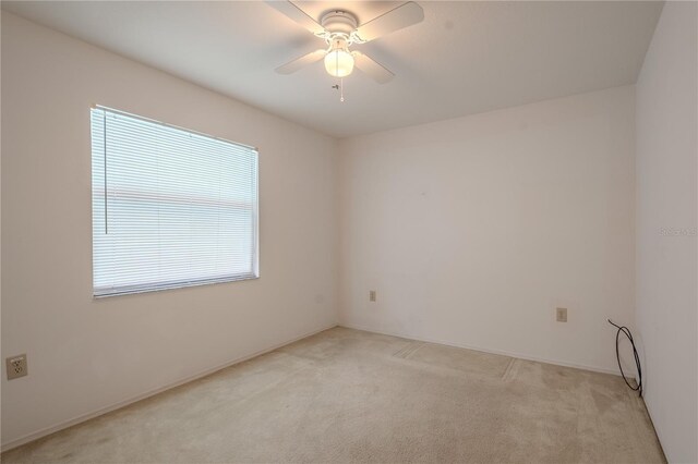 1838 Eagle Ridge Blvd, Palm Harbor, FL 34685 - unfurnished room featuring light carpet and ceiling fan