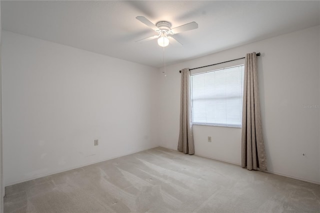 1838 Eagle Ridge Blvd, Palm Harbor, FL 34685 - unfurnished room with a ceiling fan and light colored carpet