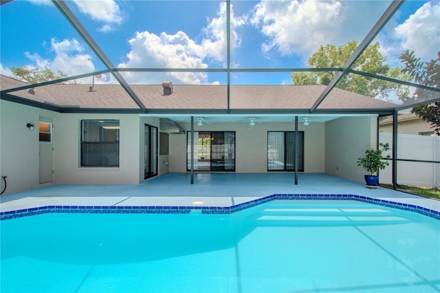 1838 Eagle Ridge Blvd, Palm Harbor, FL 34685 - view of swimming pool with ceiling fan, a patio area, and a lanai