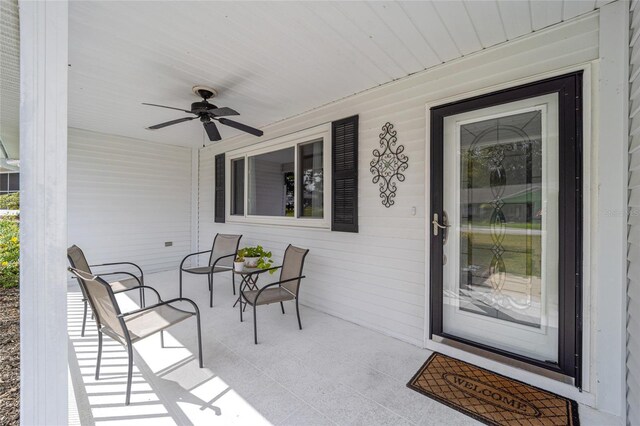 8225 SW 108th Street Rd, Ocala, FL 34481 - entrance to property with covered porch and a ceiling fan