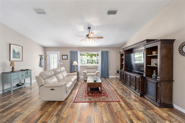 8225 SW 108th Street Rd, Ocala, FL 34481 - living room featuring a ceiling fan, wood finished floors, a textured ceiling, baseboards, and vaulted ceiling