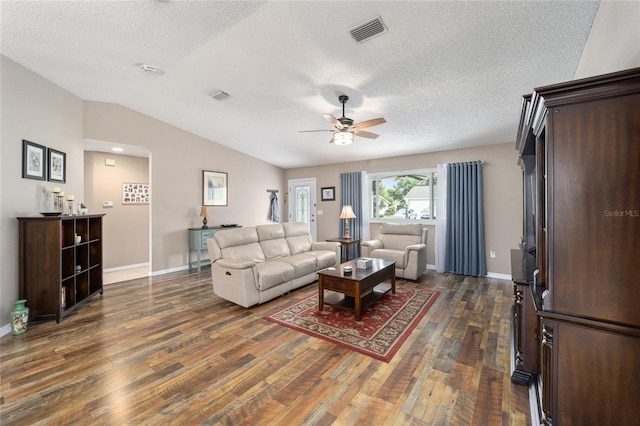 8225 SW 108th Street Rd, Ocala, FL 34481 - living area with a ceiling fan, dark wood finished floors, lofted ceiling, a textured ceiling, and baseboards