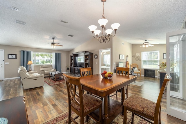 8225 SW 108th Street Rd, Ocala, FL 34481 - dining room featuring ceiling fan, a textured ceiling, dark wood-type flooring, a chandelier, and baseboards