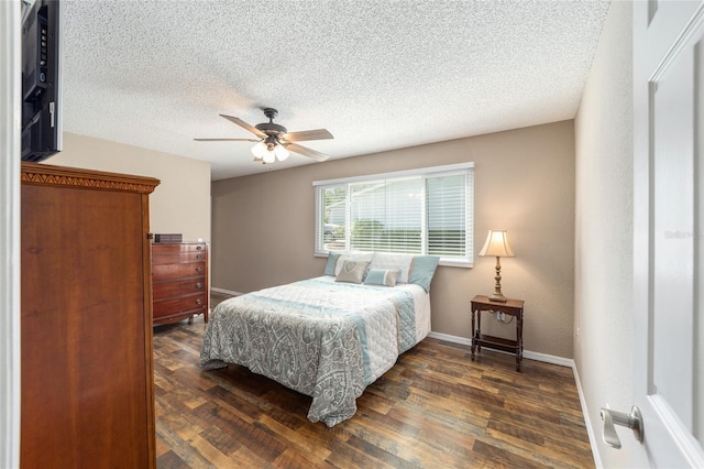 8225 SW 108th Street Rd, Ocala, FL 34481 - bedroom with wood finished floors, a textured ceiling, baseboards, and a ceiling fan