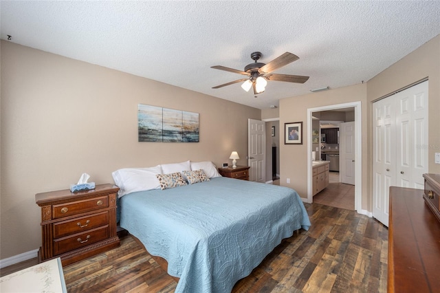8225 SW 108th Street Rd, Ocala, FL 34481 - bedroom with dark wood-type flooring, a textured ceiling, a closet, a ceiling fan, and baseboards