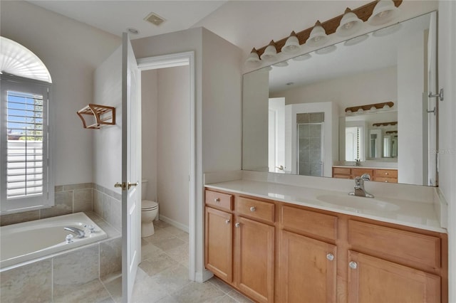 27440 Cedar Park Ct, Wesley Chapel, FL 33544 - bathroom with toilet, vanity, a bath, and tile patterned floors