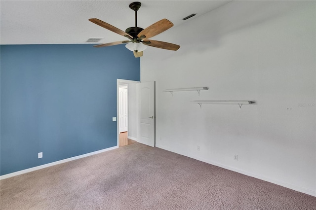 27440 Cedar Park Ct, Wesley Chapel, FL 33544 - spare room with carpet, a ceiling fan, baseboards, and high vaulted ceiling