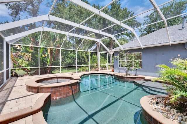 27440 Cedar Park Ct, Wesley Chapel, FL 33544 - view of swimming pool with a pool with connected hot tub and a lanai