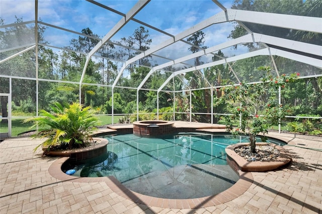 27440 Cedar Park Ct, Wesley Chapel, FL 33544 - view of swimming pool with a pool with connected hot tub, a patio, and glass enclosure