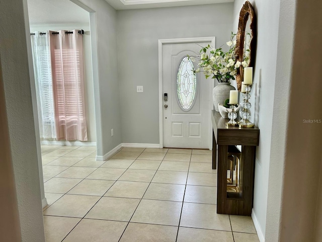 14015 Arbor Pines Dr, Riverview, FL 33579 - foyer with light tile patterned floors and baseboards