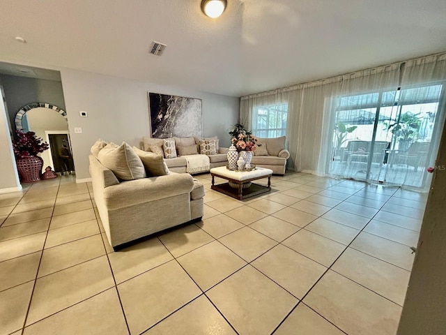 14015 Arbor Pines Dr, Riverview, FL 33579 - living room with light tile patterned floors and baseboards