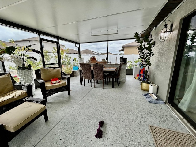14015 Arbor Pines Dr, Riverview, FL 33579 - sunroom / solarium featuring speckle patterned floor and floor to ceiling windows