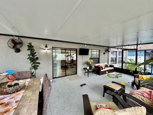 14015 Arbor Pines Dr, Riverview, FL 33579 - sunroom featuring a textured wall and ornamental molding