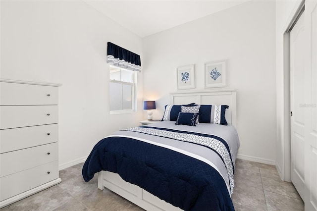 1890 Flora Pass Pl, Kissimmee, FL 34747 - bedroom featuring tile patterned flooring and baseboards