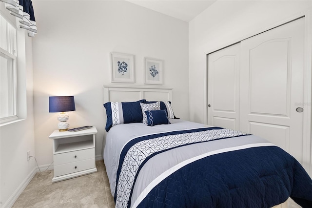 1890 Flora Pass Pl, Kissimmee, FL 34747 - bedroom featuring baseboards and a closet