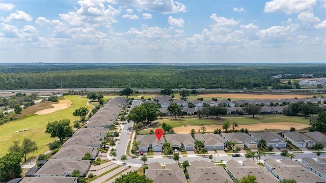 1890 Flora Pass Pl, Kissimmee, FL 34747 - aerial perspective of suburban area featuring a local golf course and a heavily wooded area