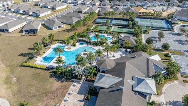 1890 Flora Pass Pl, Kissimmee, FL 34747 - aerial perspective of suburban area featuring a pool area
