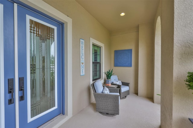 6016 Shadowlake Dr, Apollo Beach, FL 33572 - doorway to property featuring stucco siding