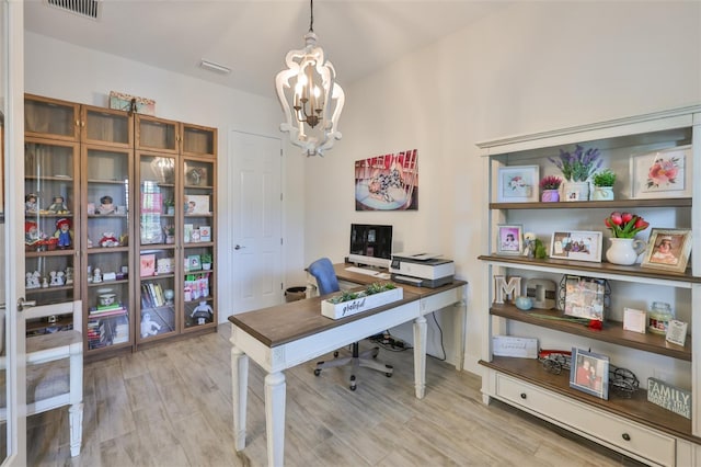 6016 Shadowlake Dr, Apollo Beach, FL 33572 - office area featuring a chandelier and light wood-style floors