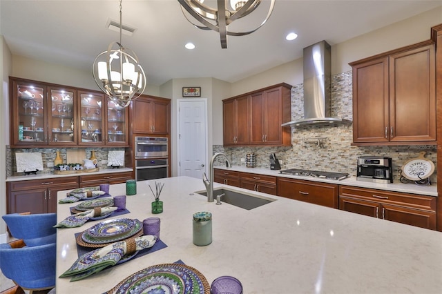 6016 Shadowlake Dr, Apollo Beach, FL 33572 - kitchen with wall chimney range hood, a sink, stainless steel appliances, backsplash, and recessed lighting