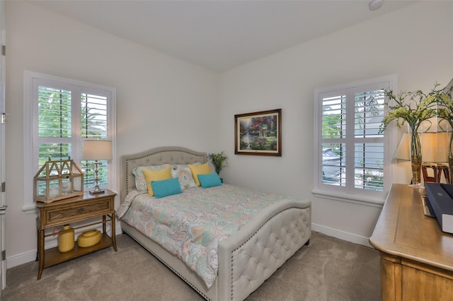 6016 Shadowlake Dr, Apollo Beach, FL 33572 - carpeted bedroom with multiple windows and baseboards