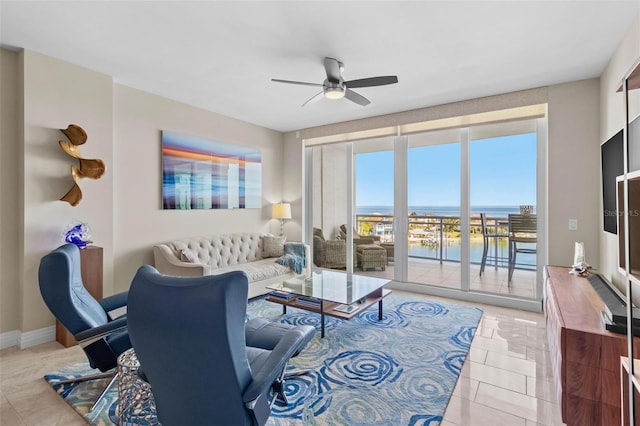 1325 Snell Isle Blvd NE Unit 708, Saint Petersburg, FL 33704 - living room with ceiling fan, light tile patterned flooring, and baseboards