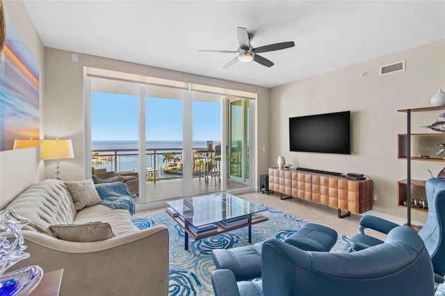 1325 Snell Isle Blvd NE Unit 708, Saint Petersburg, FL 33704 - tiled living room featuring ceiling fan