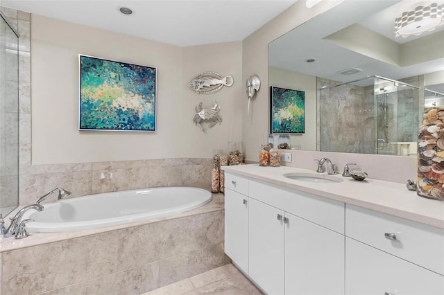 1325 Snell Isle Blvd NE Unit 708, Saint Petersburg, FL 33704 - full bathroom with vanity, a garden tub, a shower stall, and tile patterned flooring