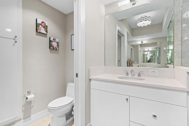 1325 Snell Isle Blvd NE Unit 708, Saint Petersburg, FL 33704 - bathroom featuring toilet, vanity, and baseboards