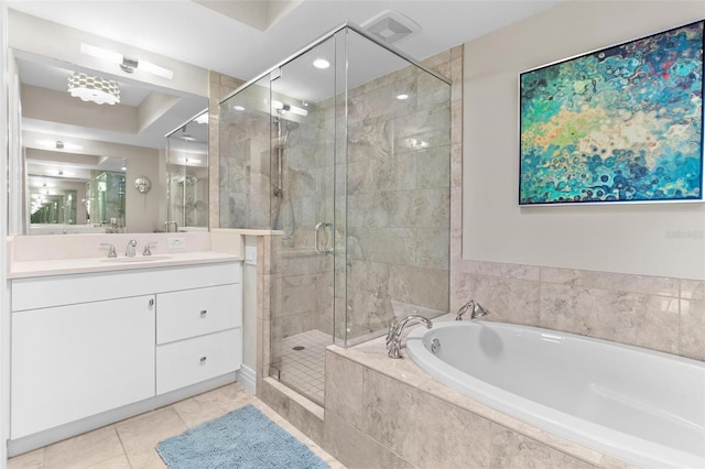 1325 Snell Isle Blvd NE Unit 708, Saint Petersburg, FL 33704 - bathroom with a bath, vanity, a shower stall, and tile patterned floors