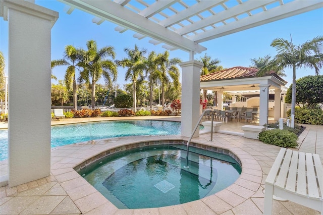 1325 Snell Isle Blvd NE Unit 708, Saint Petersburg, FL 33704 - swimming pool featuring an in-ground hot tub, a patio, a pergola, a gazebo, and a ceiling fan
