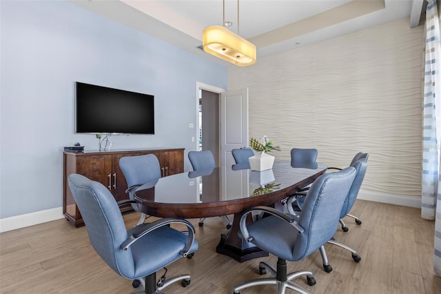 1325 Snell Isle Blvd NE Unit 708, Saint Petersburg, FL 33704 - home office with baseboards, light wood-style floors, and a raised ceiling