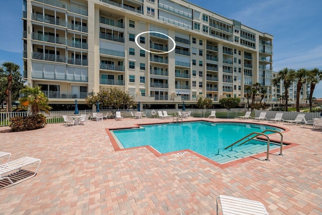 7932 Sailboat Key Blvd S Unit 506, South Pasadena, FL 33707 - community pool featuring a patio