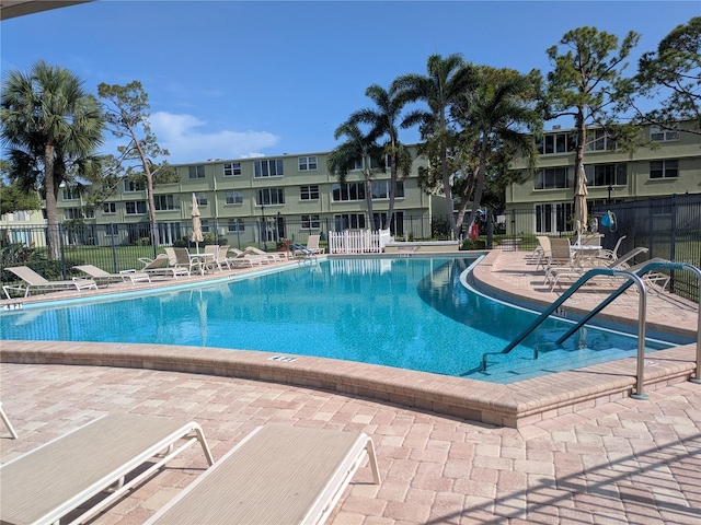 4705 NE 1st St NE Unit 327, Saint Petersburg, FL 33703 - community pool featuring a patio and a residential view