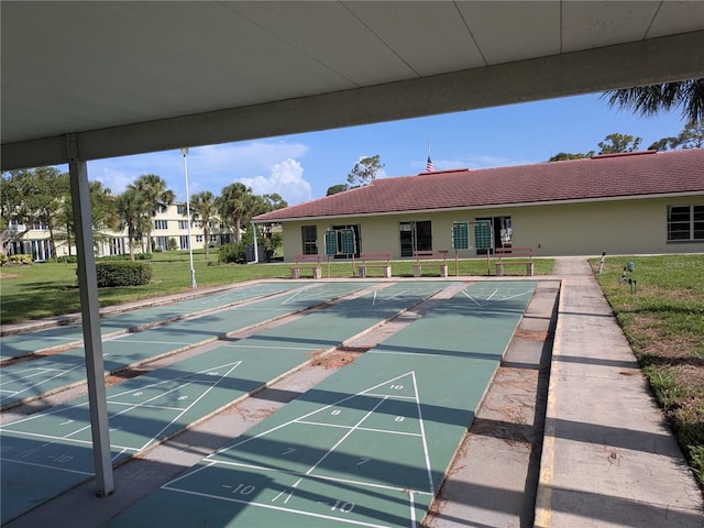 4705 NE 1st St NE Unit 327, Saint Petersburg, FL 33703 - view of property's community with a lawn and shuffleboard
