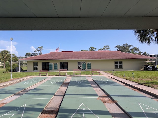 4705 NE 1st St NE Unit 327, Saint Petersburg, FL 33703 - view of home's community featuring a yard and shuffleboard