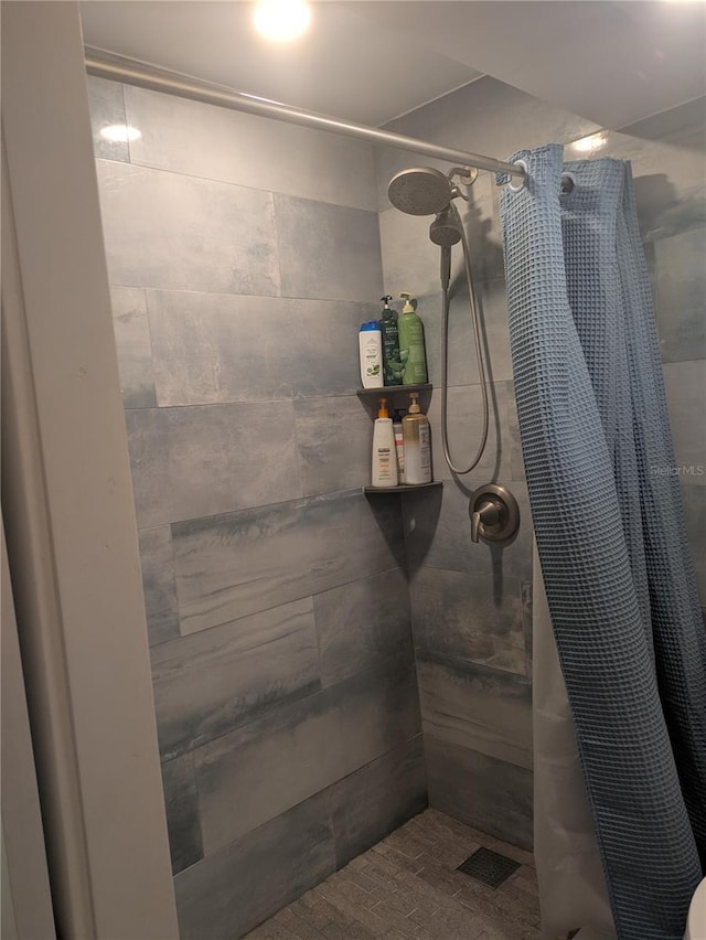 4705 NE 1st St NE Unit 327, Saint Petersburg, FL 33703 - full bathroom with a tile shower