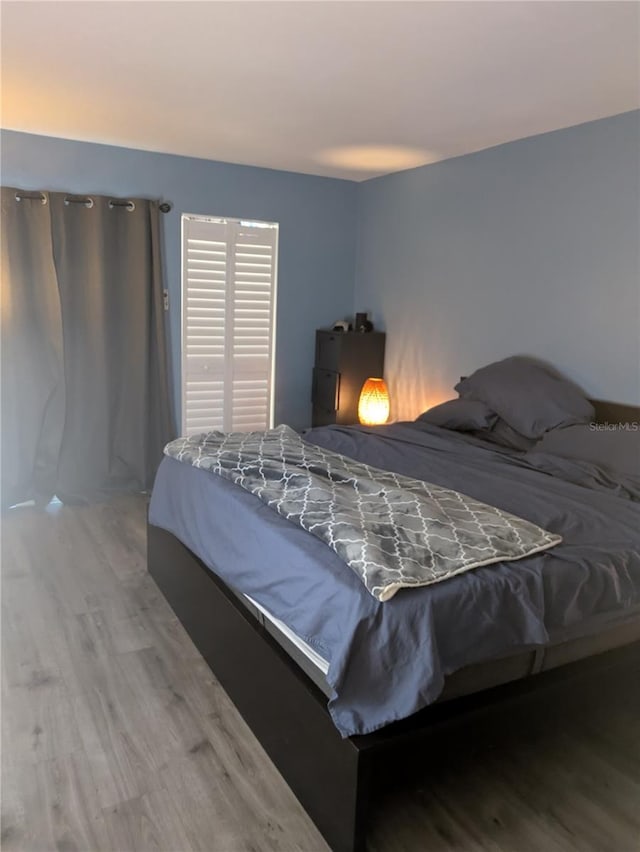 4705 NE 1st St NE Unit 327, Saint Petersburg, FL 33703 - bedroom featuring wood finished floors