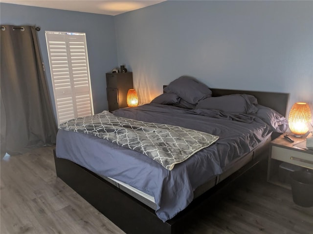 4705 NE 1st St NE Unit 327, Saint Petersburg, FL 33703 - bedroom featuring wood finished floors