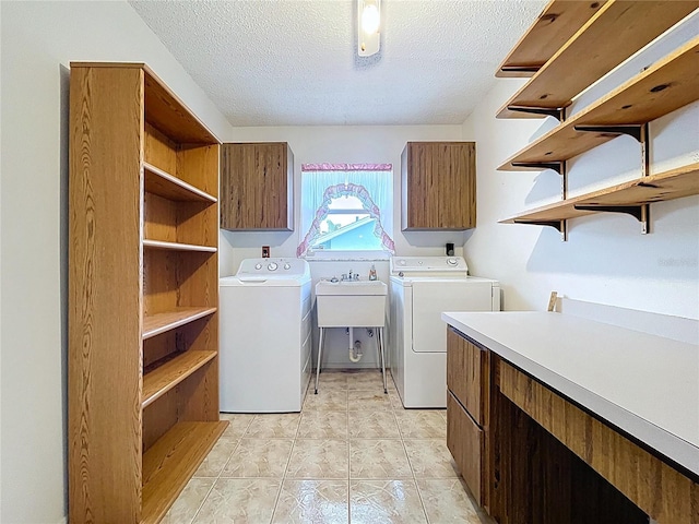 13725 Oak Forest Blvd N, Seminole, FL 33776 - washroom featuring cabinet space, washing machine and dryer, and a textured ceiling