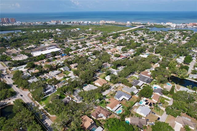 13725 Oak Forest Blvd N, Seminole, FL 33776 - aerial view of property's location featuring a nearby body of water and nearby suburban area