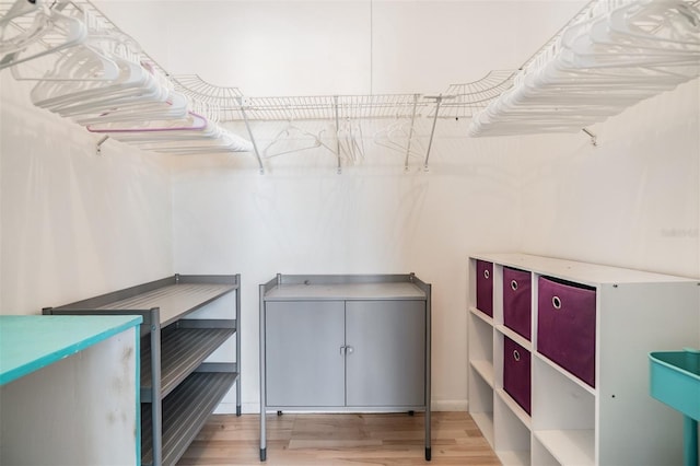 8220 12th Way N Unit G, Saint Petersburg, FL 33702 - walk in closet featuring wood finished floors