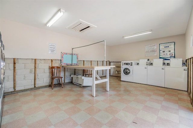 8220 12th Way N Unit G, Saint Petersburg, FL 33702 - community laundry with light flooring and independent washer and dryer
