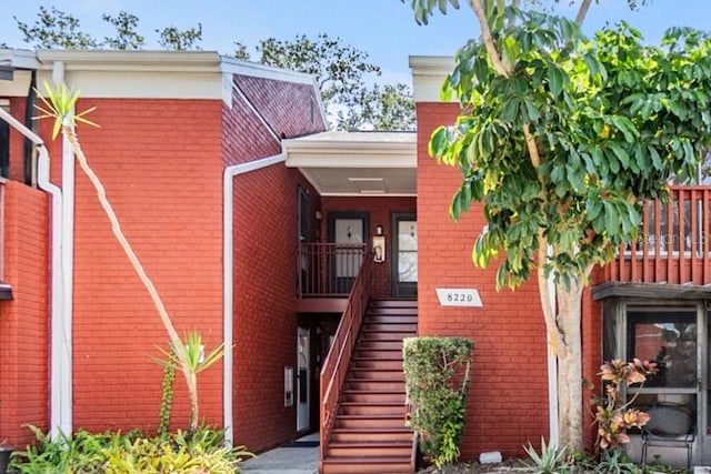 8220 12th Way N Unit G, Saint Petersburg, FL 33702 - view of building exterior featuring stairway